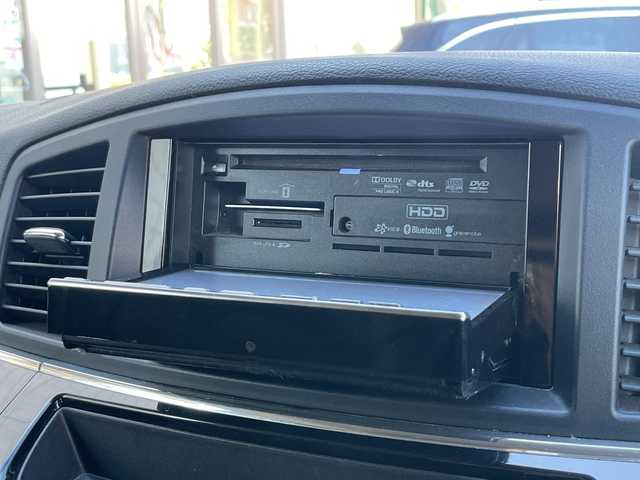 日産 エルグランド 250ハイウェイスター 静岡県 2011(平23)年 8.9万km ブリリアントホワイトパール 社外ナビ　/社外フリップダウンモニター　/両側パワスラ　/半革シート　/革巻きステアリング　/オートライト　/ウィンカーミラー　/木目調パネル/ETC　/純正１８インチＡＷ　/スマートキー　/スペアキー　/保証書　/取説