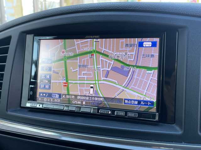 日産 エルグランド 250ハイウェイスター 静岡県 2011(平23)年 8.9万km ブリリアントホワイトパール 社外ナビ　/社外フリップダウンモニター　/両側パワスラ　/半革シート　/革巻きステアリング　/オートライト　/ウィンカーミラー　/木目調パネル/ETC　/純正１８インチＡＷ　/スマートキー　/スペアキー　/保証書　/取説