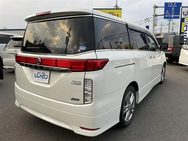 日産 エルグランド 250ハイウェイスター 和歌山県 2011(平23)年 8.9万km ブリリアントホワイトパール (株)IDOMが運営する【じしゃロン和歌山店】の自社ローン対象車両になります。こちらは現金ご利用時の価格です。/自社ローンご希望の方は別途その旨お申付け下さい。/社外ナビ　/社外フリップダウンモニター　/両側パワスラ　/半革シート　/革巻きステアリング　/オートライト　/ウィンカーミラー　/木目調パネル/ETC　/純正１８インチＡＷ　/スマートキー　/スペアキー　/保証書　/取説