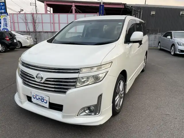 日産 エルグランド 250ハイウェイスター 和歌山県 2011(平23)年 8.9万km ブリリアントホワイトパール (株)IDOMが運営する【じしゃロン和歌山店】の自社ローン対象車両になります。こちらは現金ご利用時の価格です。/自社ローンご希望の方は別途その旨お申付け下さい。/社外ナビ　/社外フリップダウンモニター　/両側パワスラ　/半革シート　/革巻きステアリング　/オートライト　/ウィンカーミラー　/木目調パネル/ETC　/純正１８インチＡＷ　/スマートキー　/スペアキー　/保証書　/取説