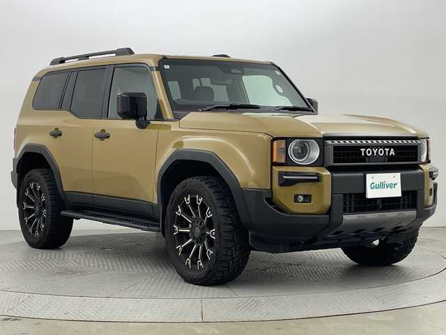 トヨタ ランドクルーザー ２５０ VX ファーストエディション 新潟県 2024(令6)年 1.3万km ベージュ ワンオーナー/純正ナビ/フルセグ＆ＢＴ/サイド・バックモニター/クリムゾン２０インチアルミ/サンルーフ/レザーシート/シートヒーター/エアシート/ハンドルヒーター/ＪＢＬサウンド/ＬＥＤ（丸目）/モデリスタシグネチャーイルミブレード/モデリスタＬＥＤフォグ/デジタルインナーミラー/スマートキー/スペアキー/ビルトインＥＴＣ/ＨＤＭＩ/タイプＣ充電/置くだけ充電/保証書＆整備手帳＆取説