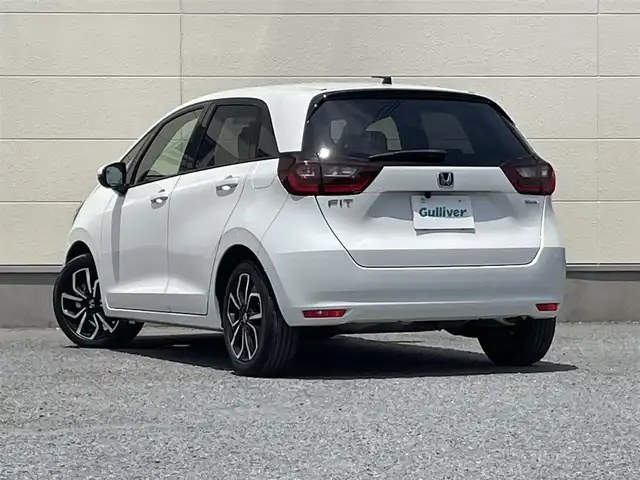 ホンダ フィット e:HEVベーシック 茨城県 2021(令3)年 2.9万km 白 社外ナビ７インチ/ワンセグテレビ/バックカメラ/クルーズコントロール/オートライト/LEDヘッドライト/カーテンエアバック/パワステ/パワーウィンドウ/横滑り防止/ABS/スマートキー/純正フロアマット