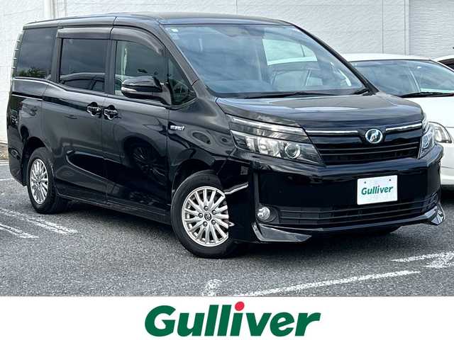 トヨタ ヴォクシー ハイブリッド V 千葉県 2014(平26)年 10.3万km ブラック ナビNSZN-W64T バックカメラ 両側電動スライドドア 置くだけ充電 シートヒーター クルコン DVD フルセグ ビルトインETC スマートキー プッシュスタート オートライト HID TRC