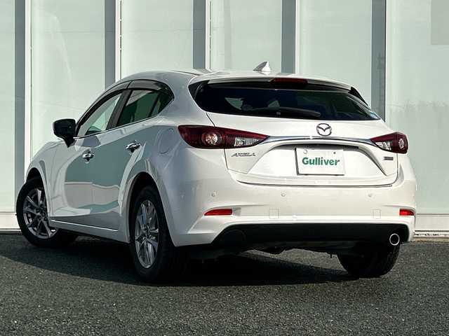 マツダ アクセラ スポーツ 15S プロアクティブ 福岡県 2019(平31)年 4.3万km スノーフレイクホワイトパールマイカ 純正ナビ/（フルセグ/FM/AM/Bluetooth/USB/CD/DVD/AUX）/アラウンドビューモニター/ETC/ブラインドスポットモニター/横滑り防止装置/レーンキープアシスト/衝突被害軽減システム/パーキングセンサー/LEDヘッドライト/フォグランプ/レーダークルーズコントロール/パドルシフト/ヘッドアップディスプレイ/ステアリングスイッチ/ヒートステアリング/D/N席シートヒーター/D席パワーシート/電動格納ミラー/ドアバイザー/スマートキー/スペアキー