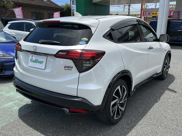 ホンダ ヴェゼル ハイブリッド RS ホンダセンシング 埼玉県 2018(平30)年 5万km プラチナホワイトパール 	ナビ装着用スペシャルパッケージ＋ETC車載器/	Honda SENSING/	前席用 i-サイドエアバッグシステム＋サイドカーテンエアバッグシステム(前席/後席対応)/	コンフォートビューパッケージ/	LEDヘッドライト/	LEDフォグライト/	コンビシート(ウルトラスエード)/	運転席＆助手席シートヒーター/	18インチアルミホイール/　　 ハーフレザーシート/     DVD再生機能/　　 フルセグ/　　 バックカメラ/      クルーズコントロール（追従走行）