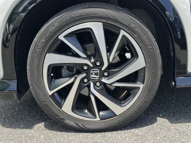ホンダ ヴェゼル ハイブリッド RS ホンダセンシング 埼玉県 2018(平30)年 5万km プラチナホワイトパール 	ナビ装着用スペシャルパッケージ＋ETC車載器/	Honda SENSING/	前席用 i-サイドエアバッグシステム＋サイドカーテンエアバッグシステム(前席/後席対応)/	コンフォートビューパッケージ/	LEDヘッドライト/	LEDフォグライト/	コンビシート(ウルトラスエード)/	運転席＆助手席シートヒーター/	18インチアルミホイール/　　 ハーフレザーシート/     DVD再生機能/　　 フルセグ/　　 バックカメラ/      クルーズコントロール（追従走行）