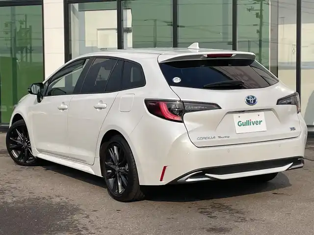 トヨタ カローラツーリング ハイブリッド ダブルバイビー 道南・函館 2023(令5)年 1.1万km プラチナホワイトパールマイカ /純正メモリナビ//フルセグＴＶ//バックカメラ//クルーズコントロール//ブラインドスポットモニター//レーンキープアシスト//コーナーセンサー//衝突軽減ブレーキ//オートハイビーム//オートライト//シートヒーター//ステアリングヒーター//フロアマット//ETC2.0//スペアキー//スマートキー