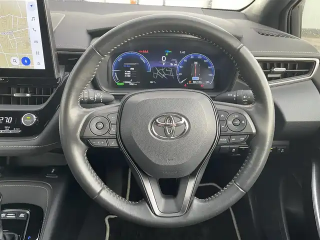 トヨタ カローラツーリング ハイブリッド ダブルバイビー 道南・函館 2023(令5)年 1.1万km プラチナホワイトパールマイカ /純正メモリナビ//フルセグＴＶ//バックカメラ//クルーズコントロール//ブラインドスポットモニター//レーンキープアシスト//コーナーセンサー//衝突軽減ブレーキ//オートハイビーム//オートライト//シートヒーター//ステアリングヒーター//フロアマット//ETC2.0//スペアキー//スマートキー