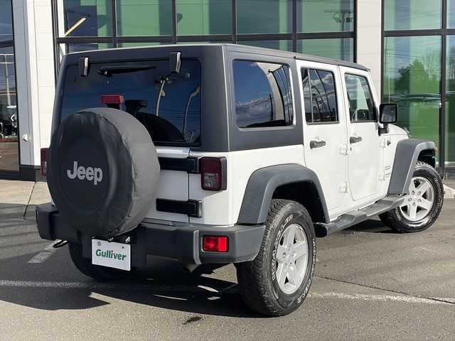 クライスラー・ジープ ジープ ラングラー アンリミテッド スポーツ 道東・釧路十勝 2015(平27)年 5.9万km ブライトホワイト ・4WD/・社外7インチナビ(BT/FM/AM/CD/DVD/HDMI/AUX)/・フルセグTV/・テレビキッド/・リモコンキー/・ETC/・前後ドラレコ/・純正フロアマット/・バックカメラ/・純正17インチアルミホイール/・LEDヘッドライト/・ヘッドライトレベライザー/・横滑り防止/・ヒルスタートアシスト/・ミラーヒーター/・スタッドレス積み込み265/70/R17　残5ミリ