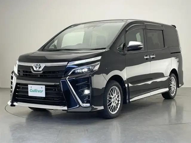 トヨタ ヴォクシー ハイブリッド ZS 煌Ⅲ 愛知県 2020(令2)年 8.2万km ブラック 純正10インチナビ/トヨタセーフティセンス/両側パワースライドドア/黒ハーフレザーシート/フルセグTV/バックカメラ/シートヒーター/前後ドライブレコーダー/ETC/クルーズコントロール/LEDオートライト/フォグランプ/コーナーセンサー/DVD/純正フロアマット/純正アルミホイール/禁煙車