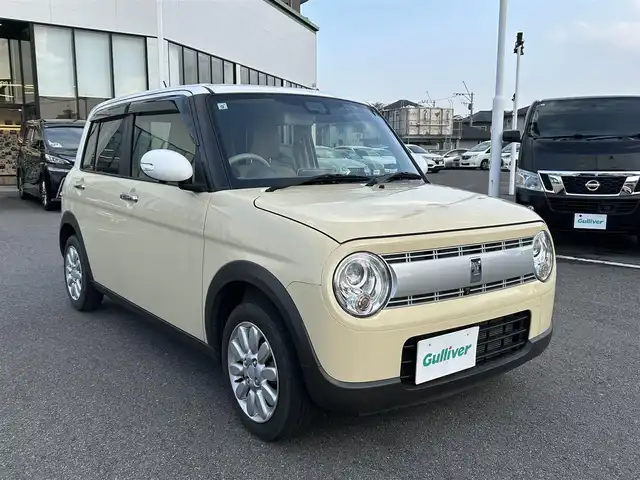 スズキ ラパン X 長崎県 2021(令3)年 4.6万km シフォンアイボリーメタリック ワンオーナー/純正ナビ（ＡＭ／ＦＭ／フルセグ／ＢＴ／ＳＤ／ＤＩＳＣ）/全方位カメラ/ドラレコ前方/ビルトインＥＴＣ/シートヒーター前席/コーナーセンサー/アイドリングストップ/レーンキープアシスト/ドアバイザー/純正フロアマット/純正14インチアルミホイール/保証書/取扱説明書