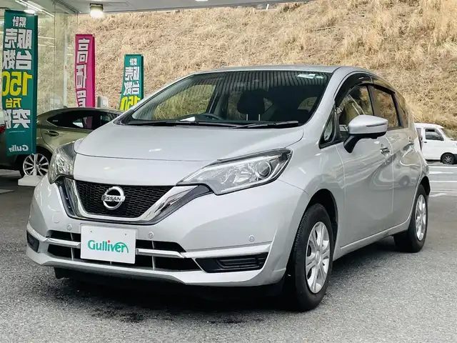 日産 ノート メダリスト X 神奈川県 2019(令1)年 1.8万km ブリリアントシルバー 登録時走行距離17166km/ワンオーナー/純正HDDナビ/　【CD/フルセグTV】/全方位カメラ/クルーズコントロール/衝突被害軽減ブレーキ/横滑り防止/ハーフレザーシート/コーナーセンサー/ビルトインETC/パドルシフト/デジタルインナーミラー/オートライト/純正LEDライト/スマートキー/プッシュスタート/アイドリングストップ/ドアバイザー/ウインカーミラー/純正フロアマット/リアプライバシーガラス/スペアキー×1【スマートキー】/新車時整備手帳（保証書）/取扱説明書