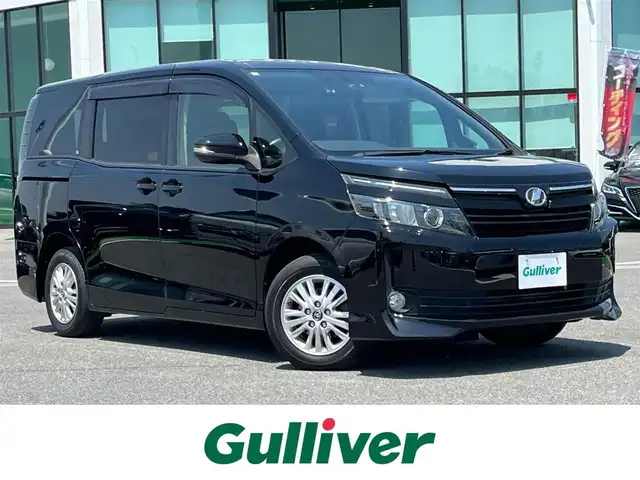 トヨタ ヴォクシー V 奈良県 2014(平26)年 7.4万km ブラック アルパインナビ/(AM/FM/CD/DVD/BT/USB/HDMI/SD/フルセグTV)/バックカメラ/アルパインフリップダウンモニター/片側パワースライドドア/オートライト/オートマチックハイビーム/ステアリングスイッチ/アイドリングストップ/純正フロアマット/電格ウインカーミラー