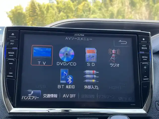 トヨタ ヴォクシー V 奈良県 2014(平26)年 7.4万km ブラック アルパインナビ/(AM/FM/CD/DVD/BT/USB/HDMI/SD/フルセグTV)/バックカメラ/アルパインフリップダウンモニター/片側パワースライドドア/オートライト/オートマチックハイビーム/ステアリングスイッチ/アイドリングストップ/純正フロアマット/電格ウインカーミラー