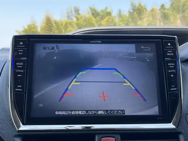 トヨタ ヴォクシー V 奈良県 2014(平26)年 7.4万km ブラック アルパインナビ/(AM/FM/CD/DVD/BT/USB/HDMI/SD/フルセグTV)/バックカメラ/アルパインフリップダウンモニター/片側パワースライドドア/オートライト/オートマチックハイビーム/ステアリングスイッチ/アイドリングストップ/純正フロアマット/電格ウインカーミラー