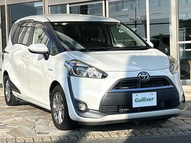 トヨタ シエンタ ハイブリッド G 静岡県 2016(平28)年 4.8万km ホワイトパールクリスタルシャイン 社外ナビ/・CD/・DVD/・Bluetooth/主要装備/・バックカメラ/・盗難防止装置/・横滑り防止/・純正アルミホイール/・純正フロアマット/・両側パワースライドドア/・ETC/・フルフラット/・スマートキー/・オートライト/・