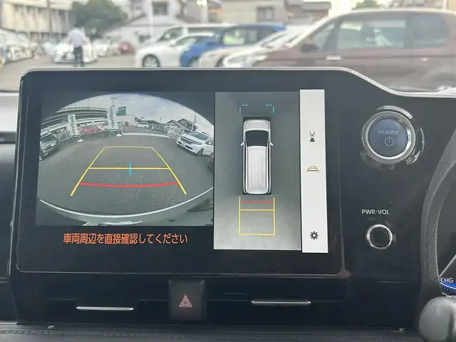 トヨタ ヴォクシー ハイブリッド S－Z 愛知県 2023(令5)年 2.8万km アティチュードブラックマイカ 快適利便パッケージ/ユニバーサルステップ/アドバンスドパーク/純正ナビ/（フルセグTV/BT/HDMI/DVDデッキ）/パノラミックビューモニター/フリップダウンモニター/ビルトイン2.0ETC/両側パワースライドドア /パワーバックドア/純正17インチAW/トヨタセーフティセンス/レーダークルーズコントロール/パーキングアシスト/ハーフレザーシート/前席シートヒーター /AC100V電源/取説、保証書/スペアキー