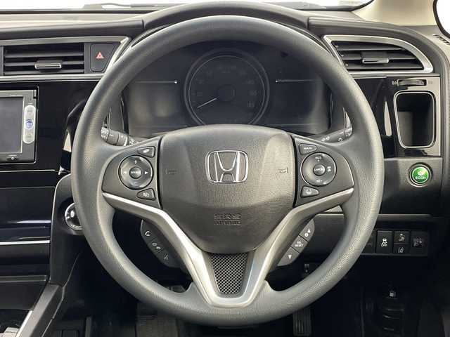 ホンダ シャトル ハイブリッド ホンダセンシング 新潟県 2020(令2)年 6.8万km シャイニンググレーM ホンダセンシング/　・衝突軽減ブレーキ/　・レーダークルーズコントロール/　・レーンキープアシスト/純正ディーラーOPナビ/バックカメラ/ビルトインETC/プッシュスタート/社外15インチアルミホイール/横滑り防止機能/電動格納ミラー/ウィンカーミラー/純正フロアマット/ドアバイザー