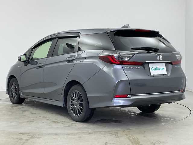 ホンダ シャトル ハイブリッド ホンダセンシング 新潟県 2020(令2)年 6.8万km シャイニンググレーM ホンダセンシング/　・衝突軽減ブレーキ/　・レーダークルーズコントロール/　・レーンキープアシスト/純正ディーラーOPナビ/バックカメラ/ビルトインETC/プッシュスタート/社外15インチアルミホイール/横滑り防止機能/電動格納ミラー/ウィンカーミラー/純正フロアマット/ドアバイザー