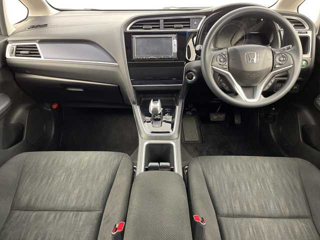 ホンダ シャトル ハイブリッド ホンダセンシング 新潟県 2020(令2)年 6.8万km シャイニンググレーM ホンダセンシング/　・衝突軽減ブレーキ/　・レーダークルーズコントロール/　・レーンキープアシスト/純正ディーラーOPナビ/バックカメラ/ビルトインETC/プッシュスタート/社外15インチアルミホイール/横滑り防止機能/電動格納ミラー/ウィンカーミラー/純正フロアマット/ドアバイザー