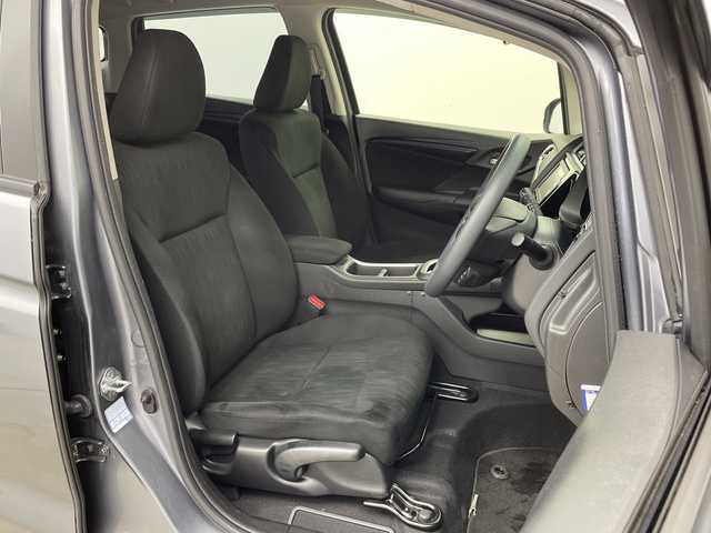 ホンダ シャトル ハイブリッド ホンダセンシング 新潟県 2020(令2)年 6.8万km シャイニンググレーM ホンダセンシング/　・衝突軽減ブレーキ/　・レーダークルーズコントロール/　・レーンキープアシスト/純正ディーラーOPナビ/バックカメラ/ビルトインETC/プッシュスタート/社外15インチアルミホイール/横滑り防止機能/電動格納ミラー/ウィンカーミラー/純正フロアマット/ドアバイザー