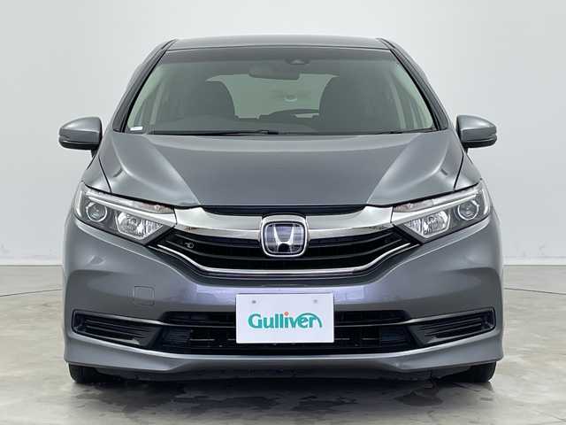 ホンダ シャトル ハイブリッド ホンダセンシング 新潟県 2020(令2)年 6.8万km シャイニンググレーM ホンダセンシング/　・衝突軽減ブレーキ/　・レーダークルーズコントロール/　・レーンキープアシスト/純正ディーラーOPナビ/バックカメラ/ビルトインETC/プッシュスタート/社外15インチアルミホイール/横滑り防止機能/電動格納ミラー/ウィンカーミラー/純正フロアマット/ドアバイザー