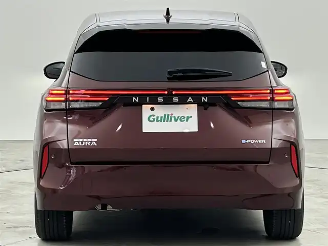 日産 オーラ G 福岡県 2022(令4)年 0.9万km バーガンディー 純正９型ナビ　/全方位カメラ　/ビルトインＥＴＣ２．０　/前後ドラレコ　/ＢＯＳＥサウンド　/ワイヤレス充電　/デジタルルームミラー　/ＡＣＣ　/プロパイロット　/コーナーセンサー　/エマージェンシーブレーキ　/ＢＳＭ