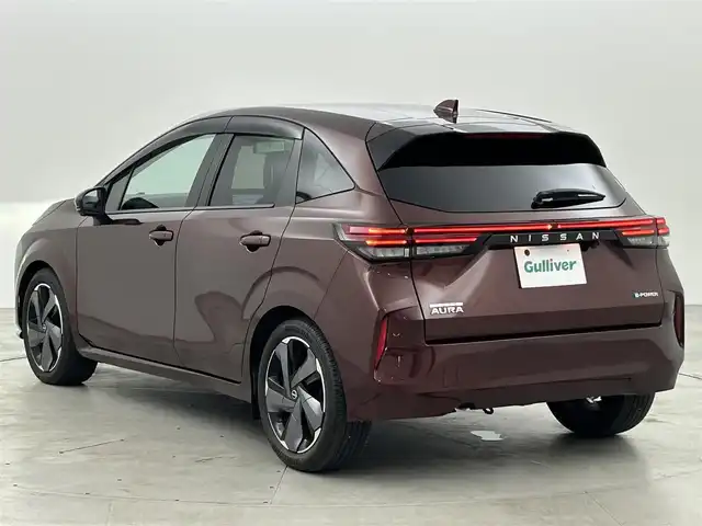 日産 オーラ G 福岡県 2022(令4)年 0.9万km バーガンディー 純正９型ナビ　/全方位カメラ　/ビルトインＥＴＣ２．０　/前後ドラレコ　/ＢＯＳＥサウンド　/ワイヤレス充電　/デジタルルームミラー　/ＡＣＣ　/プロパイロット　/コーナーセンサー　/エマージェンシーブレーキ　/ＢＳＭ