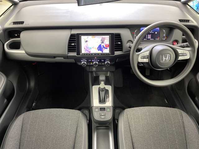 ホンダ フィット ホーム 道央・札幌 2021(令3)年 5.6万km プレミアムグラマラスブロンズP ・4WD/・ホンダセンシング/・アダプティブクルーズコントロール/・純正SDナビ/　　（フルセグTV/BT/CD/DVD）/・バックカメラ/・ステアリングスイッチ/・ワイパーデアイサー/・オートライト/LEDヘッドライト/・ecoモード/・パーキングセンサー/・前後ドライブレコーダー/・冬タイヤ積込/・横滑り防止機能/・ETC