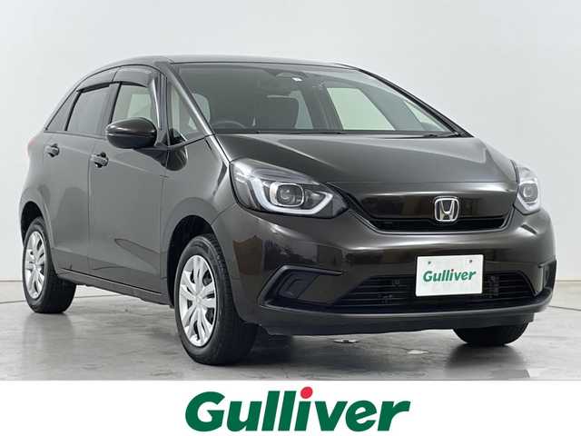 ホンダ フィット ホーム 道央・札幌 2021(令3)年 5.6万km プレミアムグラマラスブロンズP ・4WD/・ホンダセンシング/・アダプティブクルーズコントロール/・純正SDナビ/　　（フルセグTV/BT/CD/DVD）/・バックカメラ/・ステアリングスイッチ/・ワイパーデアイサー/・オートライト/LEDヘッドライト/・ecoモード/・パーキングセンサー/・前後ドライブレコーダー/・冬タイヤ積込/・横滑り防止機能/・ETC