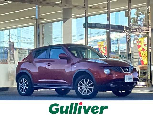 日産 ジューク 15RX タイプV 福島県 2013(平25)年 10.6万km ラディアントレッド 登録時走行距離：105148km/純正SDナビ/ (ワンセグTV/CD/AUX/iPod/VTR/AM/FM)/バックカメラ/プッシュスタート/ETC/社外デジタルインナーミラー/純正フロアマット/社外16インチAW/ハロゲンヘッドライト/フォグランプ/ドアバイザー/オートライト/スマートキー/スペアキー×１/保証書/取扱説明書