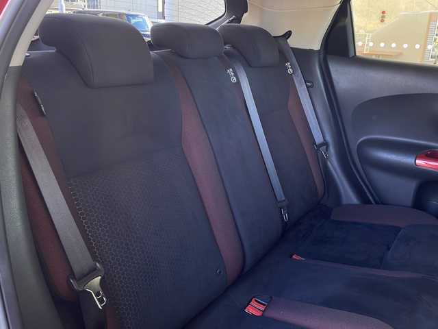 日産 ジューク 15RX タイプV 福島県 2013(平25)年 10.6万km ラディアントレッド 登録時走行距離：105148km/純正SDナビ/ (ワンセグTV/CD/AUX/iPod/VTR/AM/FM)/バックカメラ/プッシュスタート/ETC/社外デジタルインナーミラー/純正フロアマット/社外16インチAW/ハロゲンヘッドライト/フォグランプ/ドアバイザー/オートライト/スマートキー/スペアキー×１/保証書/取扱説明書