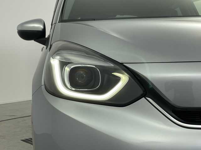 ホンダ フィット e:HEVリュクス 愛知県 2020(令2)年 4.8万km ルナシルバーM ／純正９インチナビ/／ＣＤ　ＤＶＤ　ＢＴ　ＳＤ　ＦＭ　ＡＭ/／フルセグＴＶ/／ホンダコネクト/／バックカメラ/／ETC/／ホンダセンシング/／アダプティブクルーズコントロール/／衝突被害軽減システム/／スマートキー/／スペアキー/／ハーフレザーシート/／前席シートヒーター/／ステアリングヒーター/／前後コーナーセンサー/／純正フロアマット/／電動パーキングブレーキ/／ドアバイザー/／LEDオートヘッドライト/／純正フォグランプ