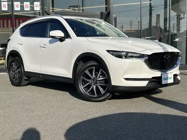 マツダ ＣＸ－５ XD Lパッケージ 兵庫県 2019(平31)年 5.9万km スノーフレイクホワイトパールマイカ BOSEサウンドシステム(OP)/360°ビューモニター(OP)/アドバンストスマートシティブレーキサポート/後退時スマートシティブレーキサポート/誤発進抑制制御/レーダークルーズコントロール/ブラインドスポットモニタリング/車線逸脱警報システム/レーンキープアシスト/リアパーキングサポート/マツダコネクト7インチナビ/　CD/DVD/Bluetooth/フルセグTV/前後ドライブレコーダー/ブラックレザーシート/前席パワーシート /前席シートヒーター/ステアリングヒーター/パワーバックドア/オートライト/LEDヘッドライト/クリアランスソナー /ヘッドアップディスプレイ/純正19インチAW/ETC/プッシュスタート/フロアマット/トノカバー