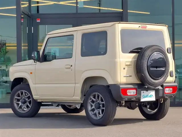 スズキ ジムニー XC 東京都 2024(令6)年 0.4万km シフォンアイボリーM 社外メモリナビ/バックカメラ/ビルトインETC/シートヒーター/クルーズコントロール/衝突軽減システム/レーンキープアシスト/LEDヘッドライト/オートライト