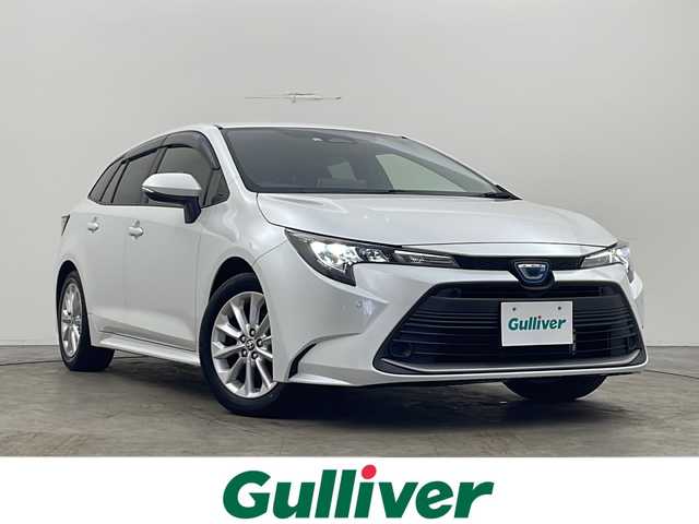 トヨタ カローラツーリング ハイブリッド G 秋田県 2022(令4)年 2.2万km プラチナホワイトパールマイカ ワンオーナー /４WD/純正ナビ【AM/FM/BT】　/フルセグＴＶ　/バックカメラ　/ＥＴＣ２．０　/フロントワイパーデアイサー　/横滑り防止装置　　/オートマチックハイビーム　/ライトレベライザー　/クリアランスソナー　/クルーズコントロール　/スマートキー/オートライト/ステアリングリモコン/オートホールド /自動パーキングブレーキ/電格ミラー/プッシュスタート /純正フロアマット/サイドバイザー /純正AW/ウィンカーミラー /コーナーセンサー /保証書/取扱説明書