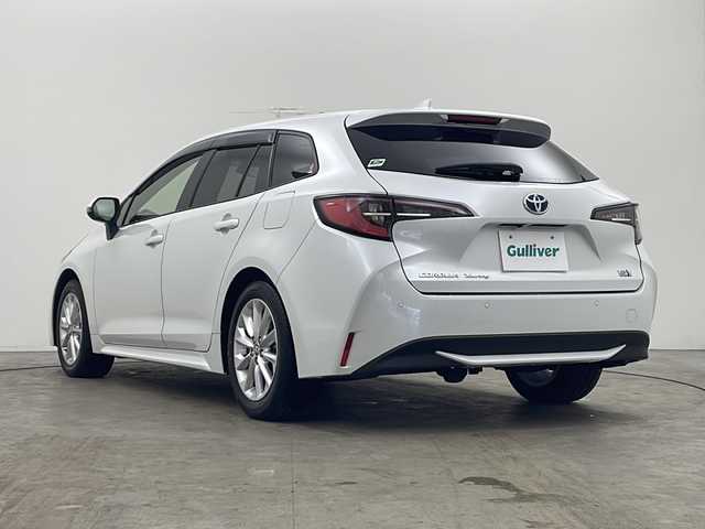 トヨタ カローラツーリング ハイブリッド G 秋田県 2022(令4)年 2.2万km プラチナホワイトパールマイカ ワンオーナー /４WD/純正ナビ【AM/FM/BT】　/フルセグＴＶ　/バックカメラ　/ＥＴＣ２．０　/フロントワイパーデアイサー　/横滑り防止装置　　/オートマチックハイビーム　/ライトレベライザー　/クリアランスソナー　/クルーズコントロール　/スマートキー/オートライト/ステアリングリモコン/オートホールド /自動パーキングブレーキ/電格ミラー/プッシュスタート /純正フロアマット/サイドバイザー /純正AW/ウィンカーミラー /コーナーセンサー /保証書/取扱説明書