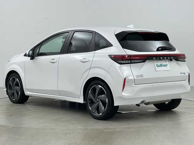 日産 オーラ G FOUR レザーエディション 道央・札幌 2022(令4)年 0.8万km ピュアホワイトパール ・禁煙車/・純正9インチナビ&TV&BT&USB&HDMI/・バックカメラ/・アラウンドビューモニター/・BOSEパーソナルプラスサウンドシステム/・プロパイロット/・全方位運転支援システム/・踏み間違え防止アシスト/・インテリジェントエマージェンシーブレーキ/・標識認識機能/・車線逸脱警報/・後退時検知機能/・SOSコール/・前席シートヒーター/・レザーシート/・ステアリングヒーター/・前方ドライブレコーダー/・ワイヤレス充電器/・ETC2.0/・純正フロアマット/・LEDオートヘッドライト/・フォグランプ/・オートライト/・スマートキー