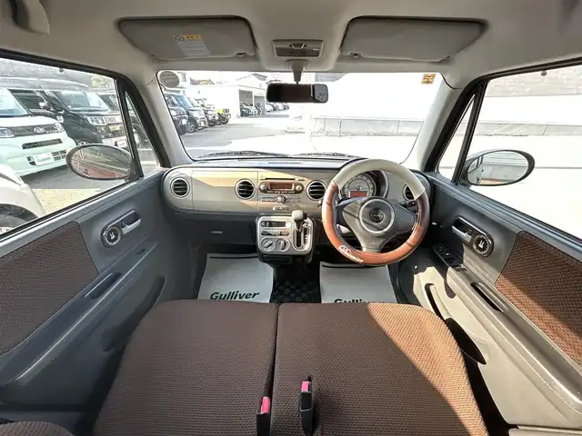 スズキ ラパン X 山形県 2012(平24)年 6.6万km マルーンブラウンパール 禁煙車/純正オーディオ/・AM/FM/CD/盗難防止装置/ハロゲンヘッドライト/プッシュスタート/スペアキー/ドアバイザー/フロアマット/ダブルエアバック/AC/純正14インチAW/保証書/取扱説明書