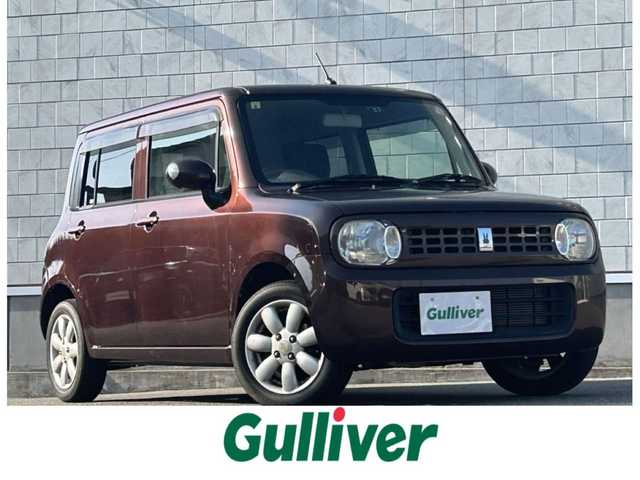 スズキ ラパン X 山形県 2012(平24)年 6.6万km マルーンブラウンパール 禁煙車/純正オーディオ/・AM/FM/CD/盗難防止装置/ハロゲンヘッドライト/プッシュスタート/スペアキー/ドアバイザー/フロアマット/ダブルエアバック/AC/純正14インチAW/保証書/取扱説明書