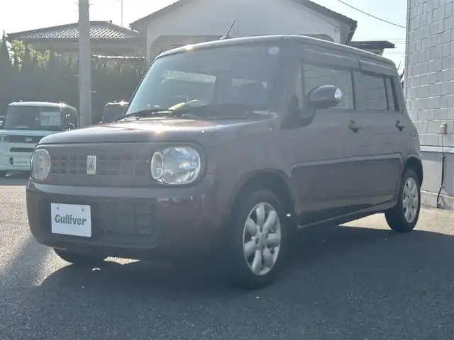 スズキ ラパン X 山形県 2012(平24)年 6.6万km マルーンブラウンパール 禁煙車/純正オーディオ/・AM/FM/CD/盗難防止装置/ハロゲンヘッドライト/プッシュスタート/スペアキー/ドアバイザー/フロアマット/ダブルエアバック/AC/純正14インチAW/保証書/取扱説明書