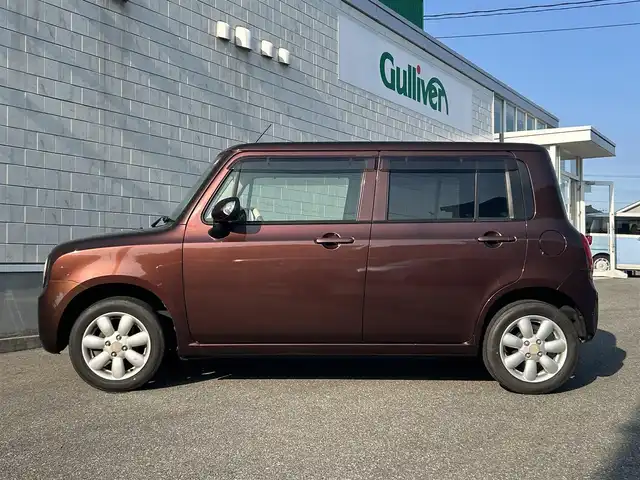 スズキ ラパン X 山形県 2012(平24)年 6.6万km マルーンブラウンパール 禁煙車/純正オーディオ/・AM/FM/CD/盗難防止装置/ハロゲンヘッドライト/プッシュスタート/スペアキー/ドアバイザー/フロアマット/ダブルエアバック/AC/純正14インチAW/保証書/取扱説明書
