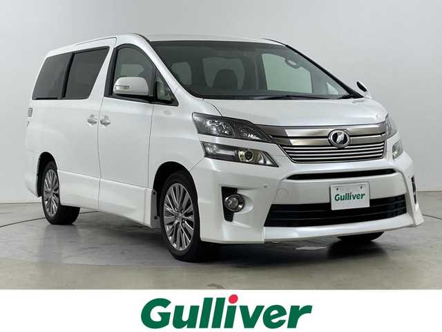 トヨタ ヴェルファイア 2．4Z ゴールデンアイズ 道央・札幌 2013(平25)年 9.7万km ホワイトパールクリスタルシャイン ・4WD/・アルパイン9インチ　SDナビ/・フルセグ/CD/DVD/BT）/・バックカメラ/・両側パワースライドドア/・クルーズコントロール/・オートライト/HIDヘッドライト/・前方ドライブレコーダー/・両側パワースライドドア/・ETC