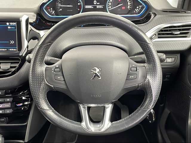 プジョー ２００８ クロスシティ 新潟県 2017(平29)年 6万km グレー ターボ/純正ナビ/(FM.AM.USB)/バックカメラ/革巻きステアリング/ステアリングリモコン/オートライト/MTモード/ドライブモード切替/電動格納ウィンカーミラー/ヘッドライトレベライザー/ハーフレザーシート/前席シートヒーター/リアコーナーセンサー/キーレス×2/純正フロアマット