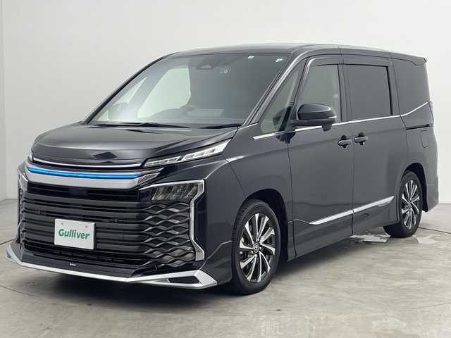 トヨタ ヴォクシー ハイブリッド S－Z 三重県 2022(令4)年 2.8万km グリッターブラックガラスフレーク 禁煙車　　/純正ナビ/DVDデッキ/バックカメラ　/純正１４インチフリップダウンモニター　/両側パワースライドドア　/モデリスタエアロ（フロント、リア）　/パワーバックドア　/デジタルインナーミラー　/ビルトインＥＴＣ２．０　/トヨタセーフティセンス/衝突軽減ブレーキ/レーンキープアシスト /全席シートヒーター/ステアリングヒーター/前後ドライブレコーダー/サイド/カーテンエアバッグ