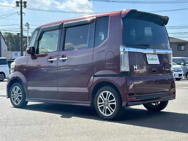 ホンダ Ｎ ＢＯＸ カスタム G Lパッケージ 鹿児島県 2015(平27)年 9.7万km プレミアムディープロッソパール 社外ナビ/　　CD/DVD/BT/フルセグ/バックカメラ/左側パワースライド/オートライト/純正14インチアルミホイール/アイドリングストップ/リアシートスライド/シートバックテーブル/オートリトラミラー/リア席サンシェード/ワンタッチウィンカー/スマートキー