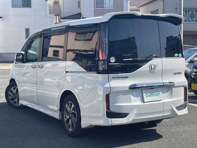ホンダ ステップワゴン スパーダ ホンダセンシング 福岡県 2016(平28)年 12.3万km ホワイトオーキッドパール ワンオーナー/純正ナビ/（AM/FM/CD/DVD/SD/Bluetooth/ミュージックボックス/フルセグTV）/フリップダウンモニター/両側パワースライドドア/ドライブレコーダー/横滑り防止/衝突軽減/レーンキープ/パーキングアシスト/クルーズコントロール追従あり/ビルドインETC/アイドリングストップ/プッシュスタート/純正フロアマット/純正アルミホイール/オートライト/フォグランプ/電格ミラー/ECOモード/スペアキー×1/保証書/取扱説明書