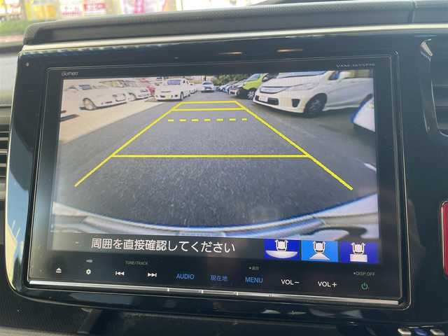 ホンダ ステップワゴン スパーダ ホンダセンシング 福岡県 2016(平28)年 12.3万km ホワイトオーキッドパール ワンオーナー/純正ナビ/（AM/FM/CD/DVD/SD/Bluetooth/ミュージックボックス/フルセグTV）/フリップダウンモニター/両側パワースライドドア/ドライブレコーダー/横滑り防止/衝突軽減/レーンキープ/パーキングアシスト/クルーズコントロール追従あり/ビルドインETC/アイドリングストップ/プッシュスタート/純正フロアマット/純正アルミホイール/オートライト/フォグランプ/電格ミラー/ECOモード/スペアキー×1/保証書/取扱説明書