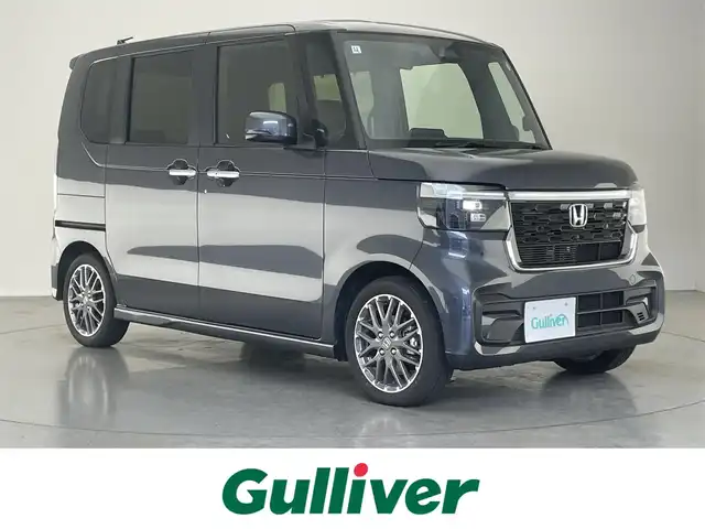 ホンダ Ｎ ＢＯＸ カスタム ターボ 愛知県 2024(令6)年 0.2万km メテオロイドグレーメタリック ホンダセンシング　両側パワースライドドア　ホンダコネクトナビ装着パッケージ　シートヒーター　電動パーキングブレーキ　衝突軽減装置　追従クルコン　黒ハーフレザー　ＬＥＤオートライト　リアシェード　禁煙車