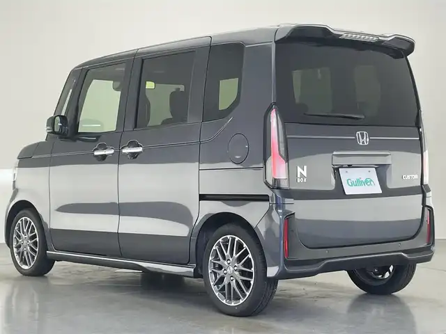 ホンダ Ｎ ＢＯＸ カスタム ターボ 愛知県 2024(令6)年 0.2万km メテオロイドグレーメタリック ホンダセンシング　両側パワースライドドア　ホンダコネクトナビ装着パッケージ　シートヒーター　電動パーキングブレーキ　衝突軽減装置　追従クルコン　黒ハーフレザー　ＬＥＤオートライト　リアシェード　禁煙車
